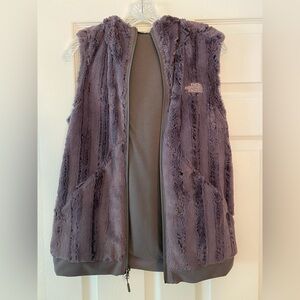 The North Face soft “furry” hooded vest.